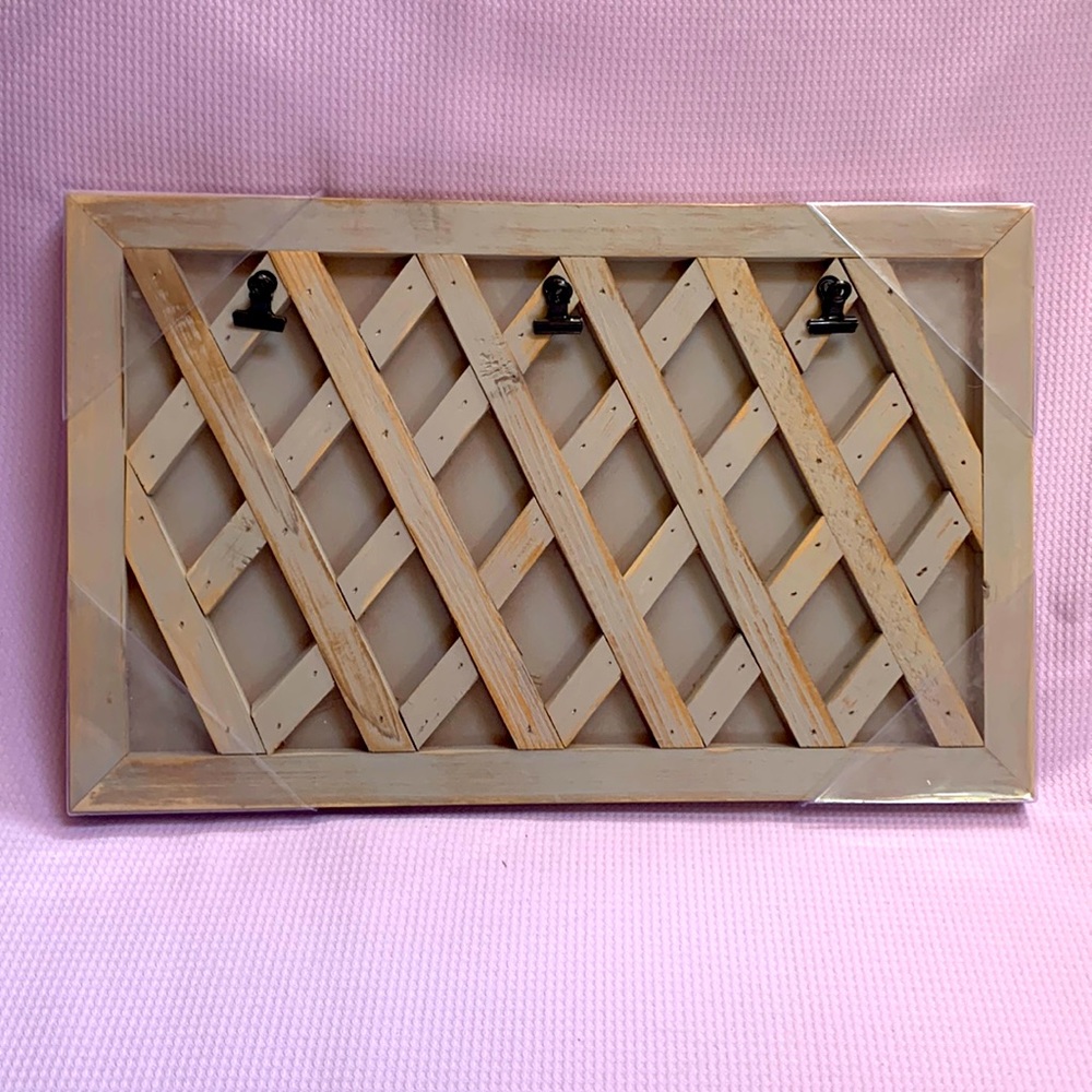 BRAND NEW!! Wall decor allows you to hang three pictures.